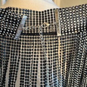 ~32" long, waist adjustable 31-37, STUNNING black rhinestone fringe skirt